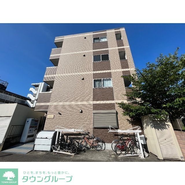 京成稲毛駅より徒歩15分 築9年8ヶ月 4階建の賃貸物件