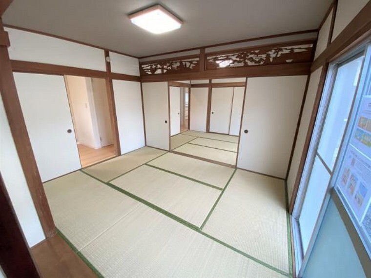 【リフォーム済写真】1階の続き間の和室は、どちらのお部屋にも掃き出し窓があるので、人がたくさん集まっても窮屈に感じませんね。