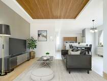 【Living room-リビングルーム-】 床暖房完備のリビング。アクセントクロスや天井一部が高くなっており、オシャレな印象を与えます。※物件写真に、CGによる画像処理（家具の配置）がされています。