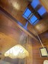 居間・リビング LDKの上部は勾配天井の為、実際よりも更に広く感じました。トップライトもついているので彩光も良好！