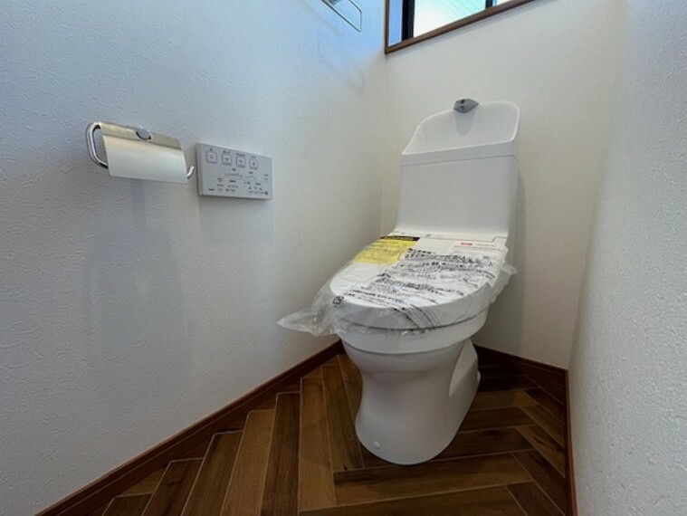 トイレ 毎日使う場所だからこそ、使い勝手を考慮しました。白を基調に、飽きのこない空間に。