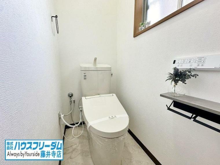 トイレ トイレ 白で統一された空間