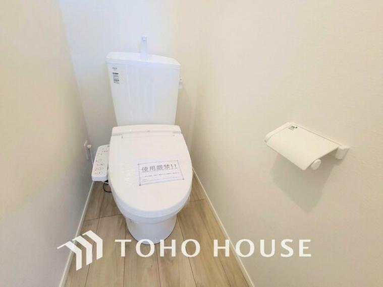 トイレ 白いクロスにより清潔感のあるトイレ
