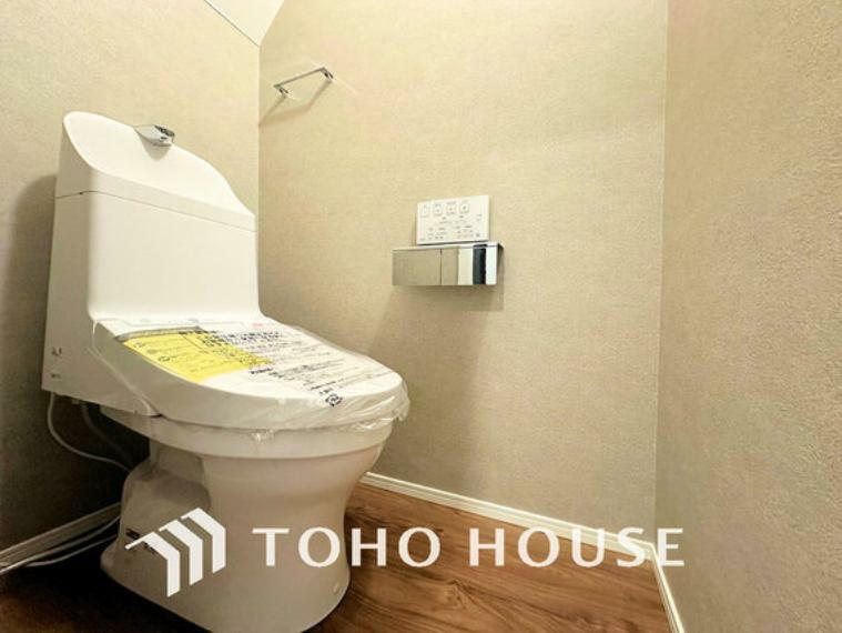 トイレ 白いクロスにより清潔感のあるトイレ